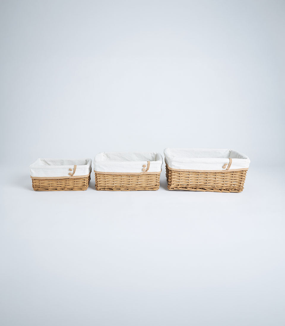 Basketeer's elegant set of three handwoven rectangular wicker baskets with crisp