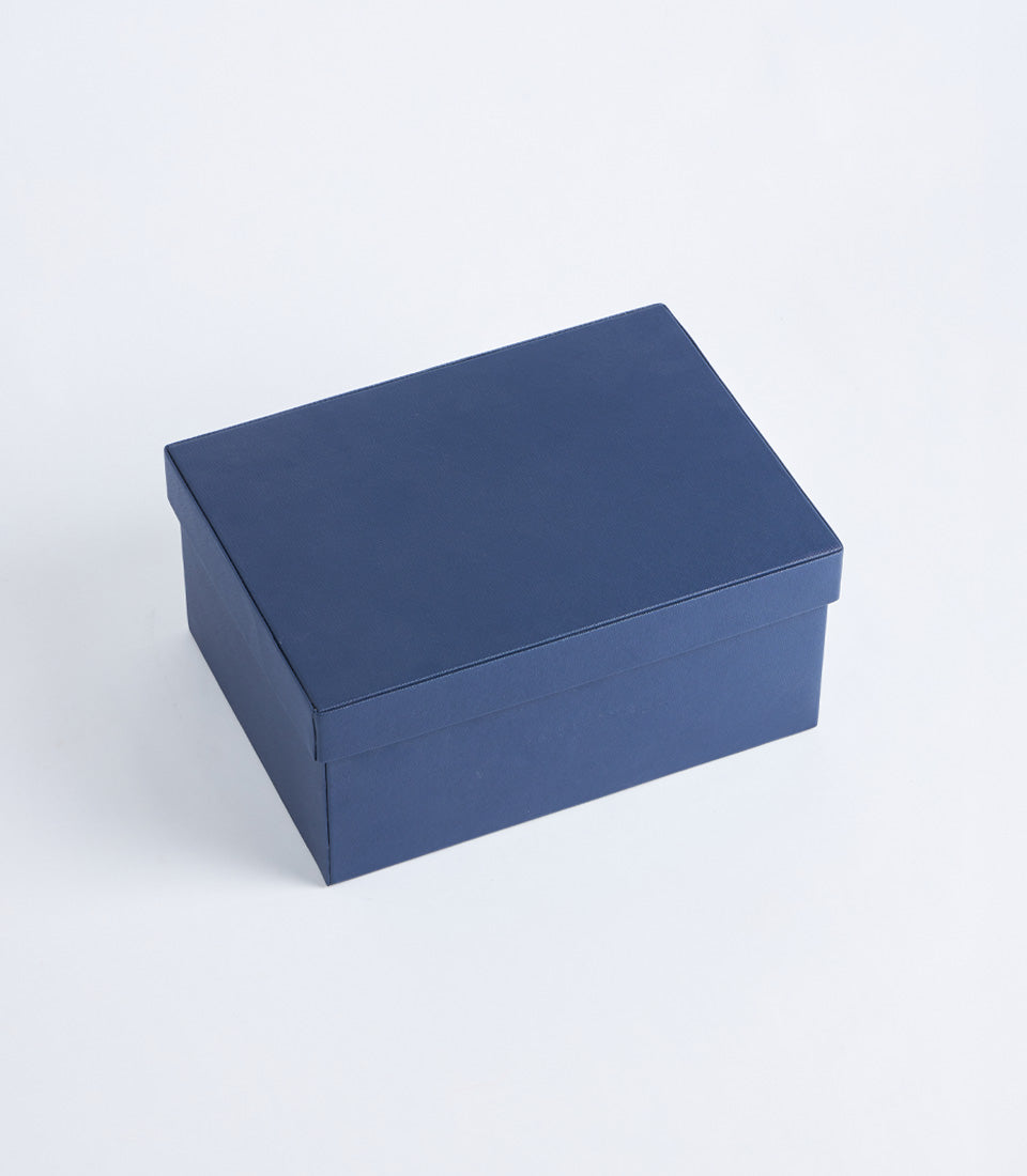Navy leather storage box with lid, minimalist gift packaging design