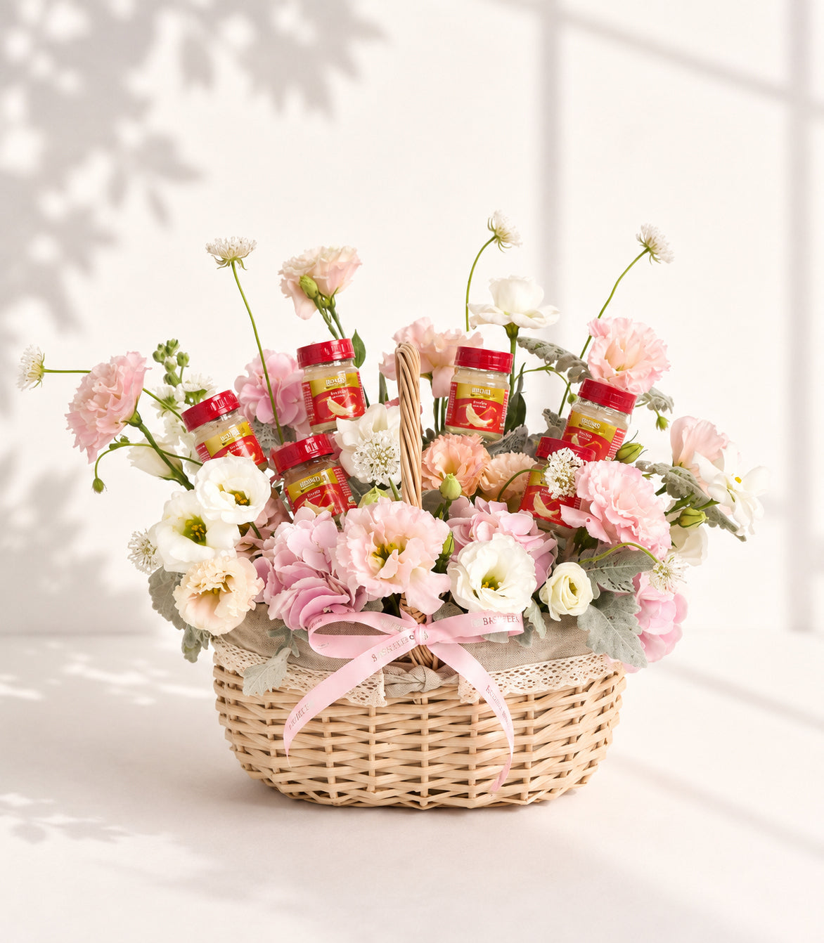 Basketeer luxury gift basket with delicate pink and white fresh flowers