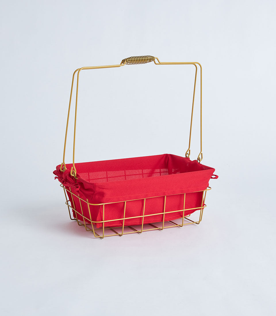 Gold metal wire gift basket with red fabric lining and arched handle for premium gifting
