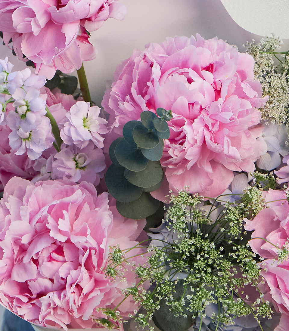 An elegant bouquet from Flowers by Basketeer featuring lush pink peonies, delicate hydrange