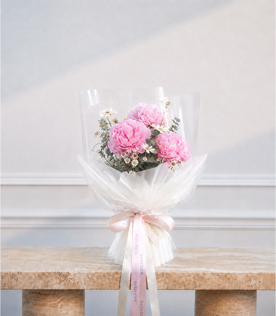 Romantic premium flower bouquet featuring three vibrant pink peonies and delicate white garden blooms,