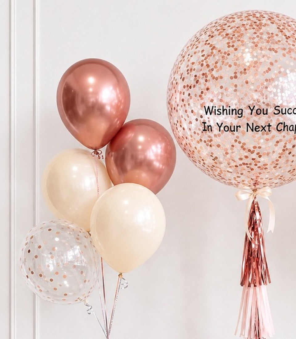 Rose gold and cream balloons with confetti-filled designs and metallic tassels against white background, displaying success message.