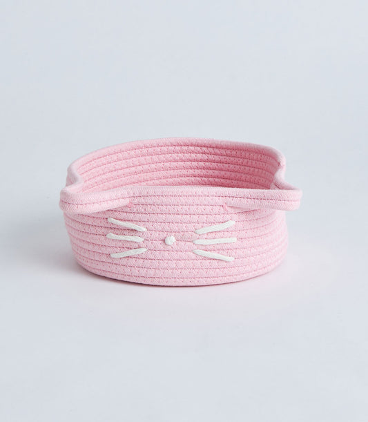 Pink woven rope storage basket with cat face design and embroidered whiskers