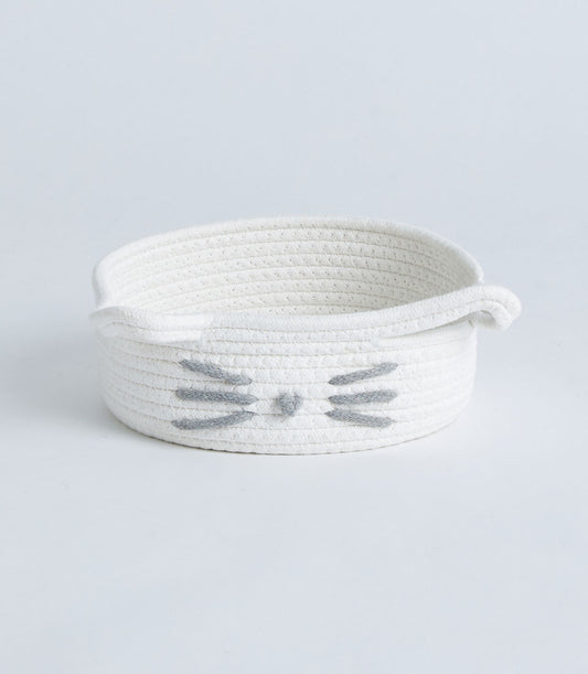 White woven cotton rope storage basket with playful cat face design and handles