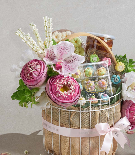 Auspicious lotus and orchid gift basket with Thai desserts and candied fruit preserves