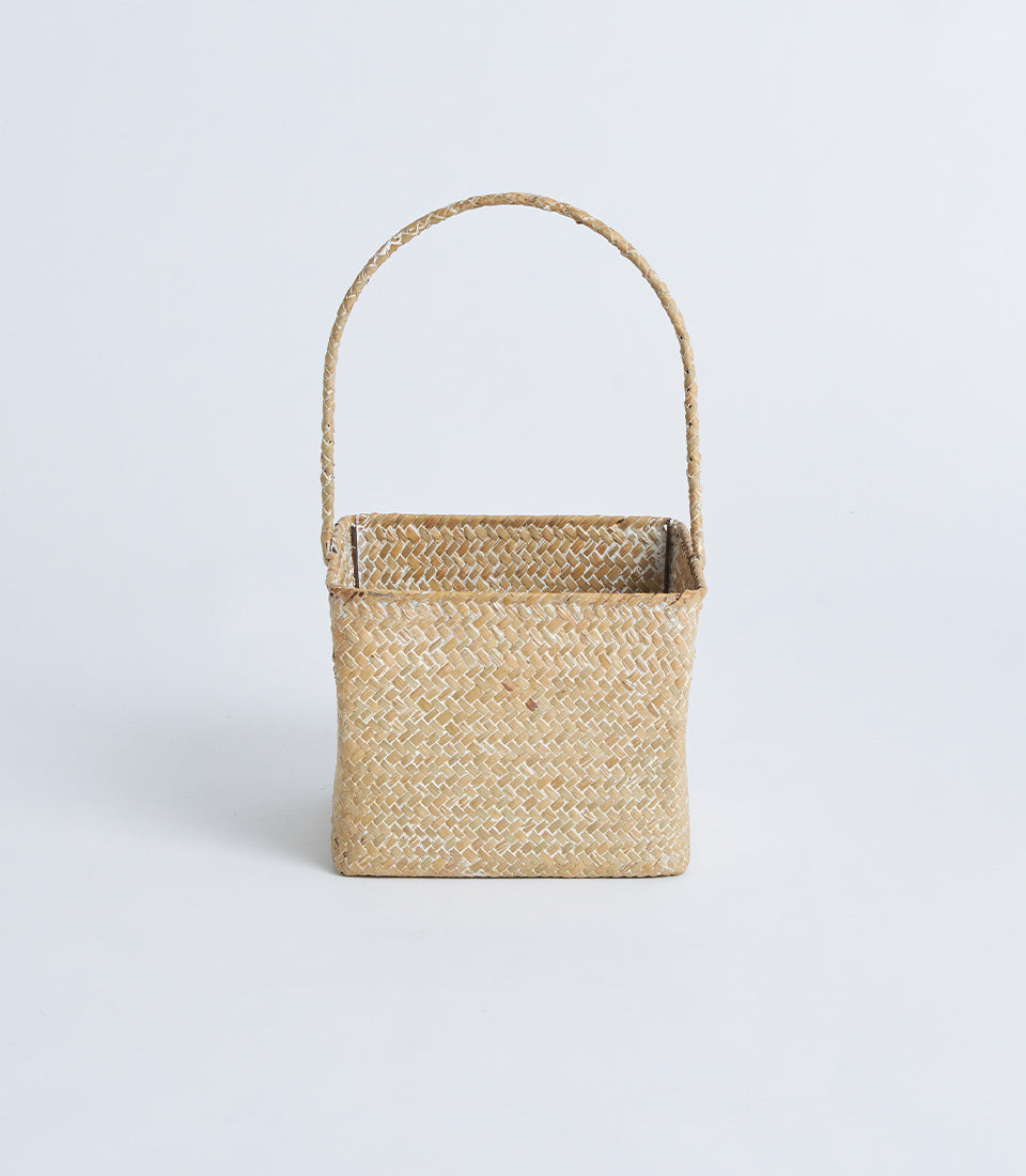 Light natural woven square basket with handle for artisan gift presentation