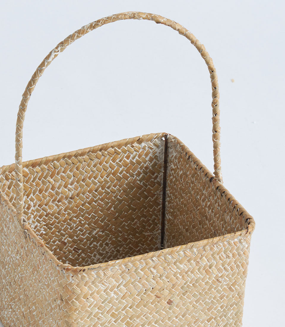 Natural woven square basket with braided handle, light tan rattan craft