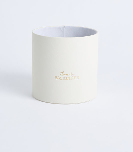 Ivory textured cylindrical flower gift box with gold foil branding