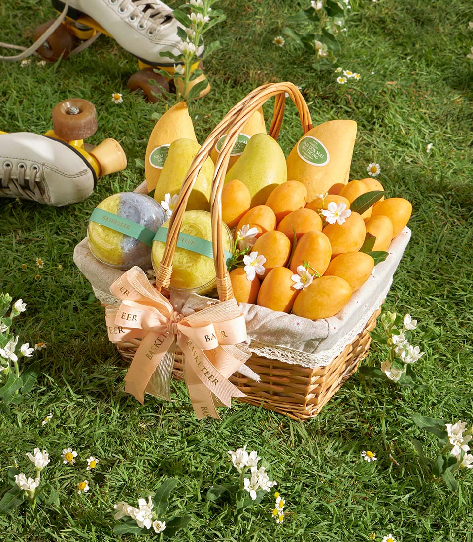 Premium Thai mango and mayongchid gift basket with sticky rice containers, wicker hamper with peach ribbon