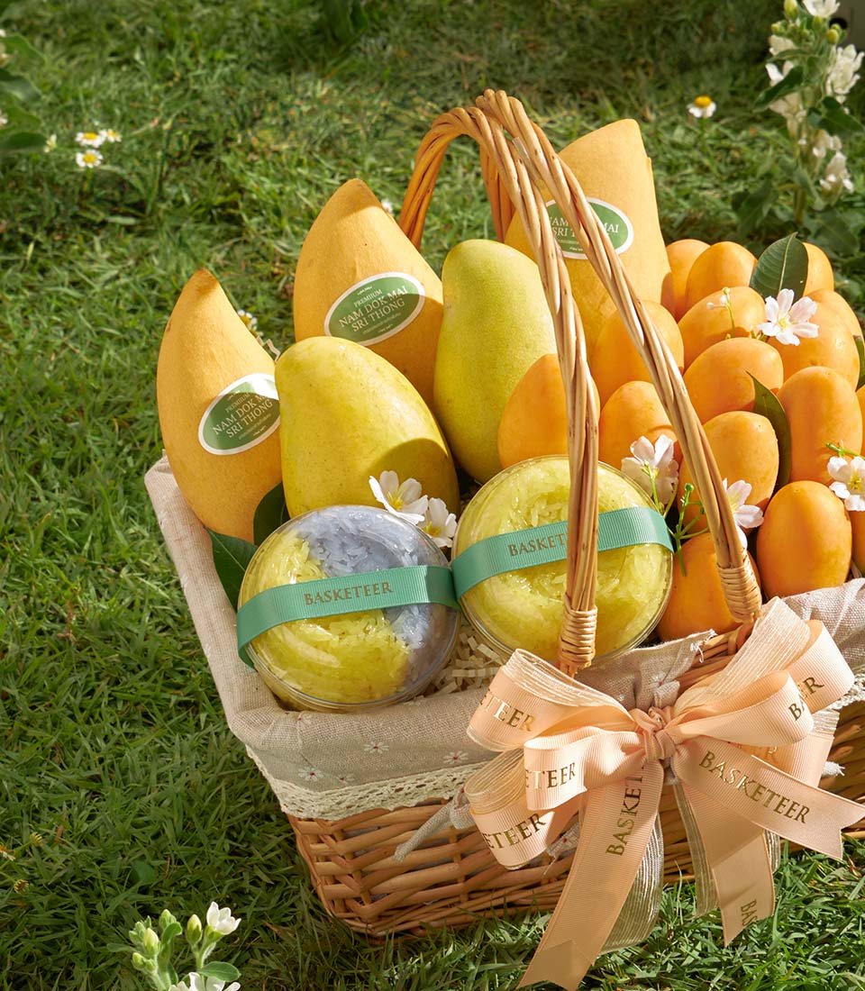 Premium Thai mango and sticky rice gourmet basket with fresh fruit and artisan treats