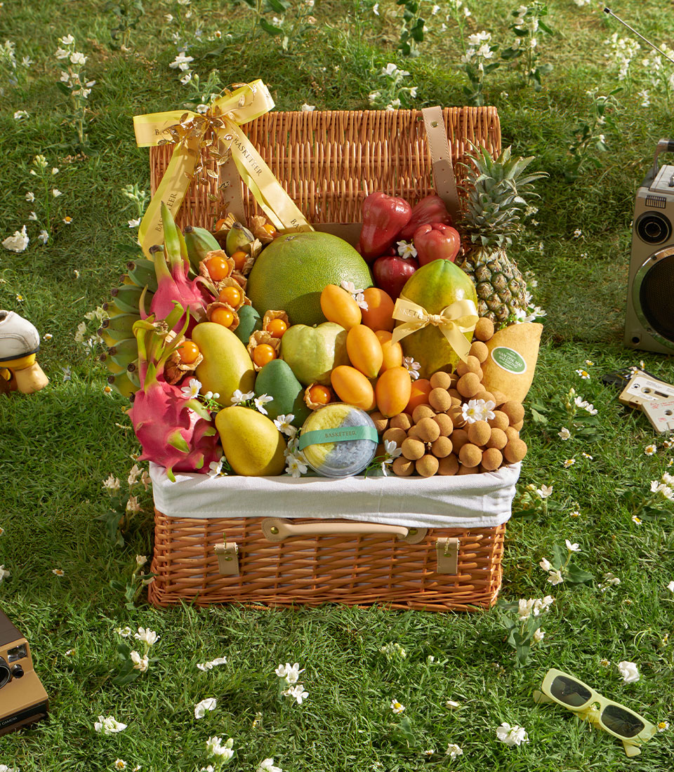 Grand Premium Fruit Hamper with mango, pomelo, longan and fresh tropical fruits in wicker basket