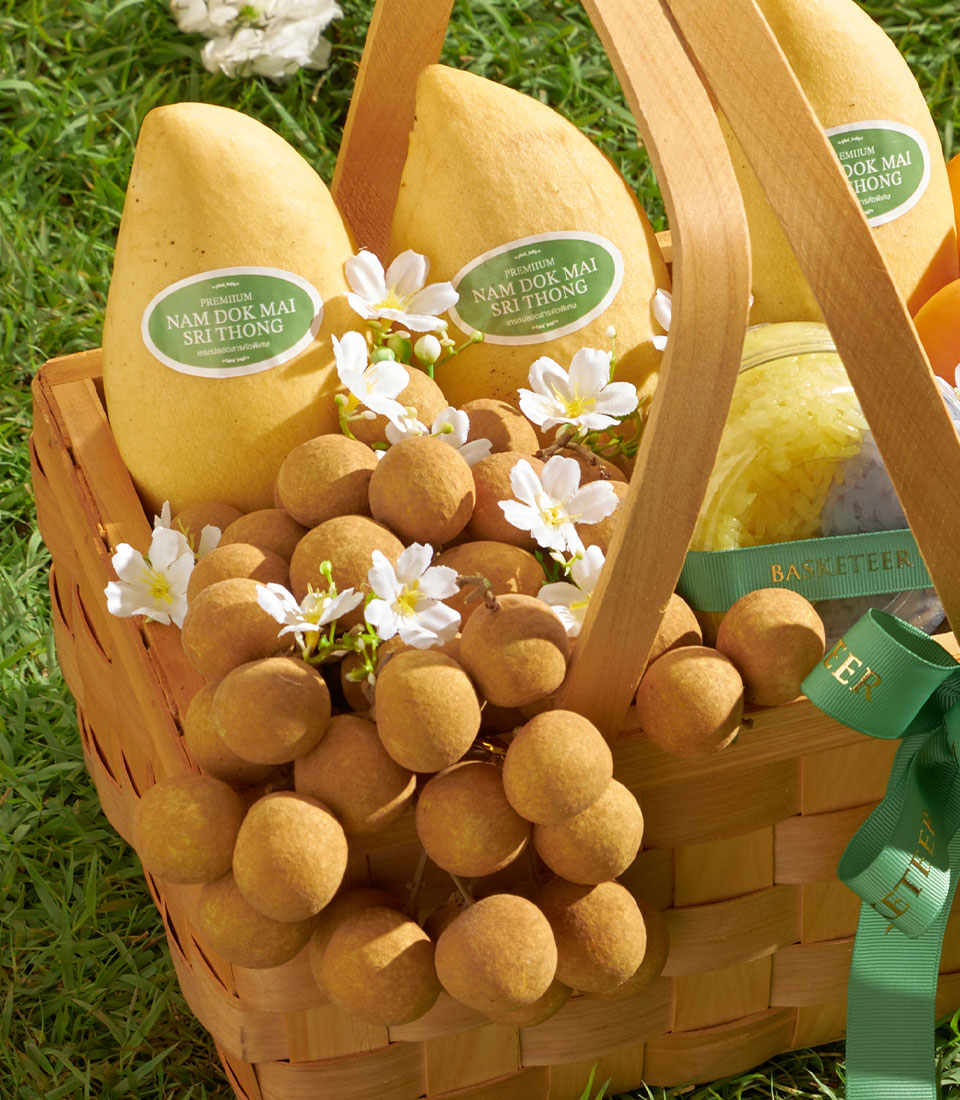 Premium longan and mango gift basket with Mayongchid dessert, woven wood presentation with fresh tropical fruits