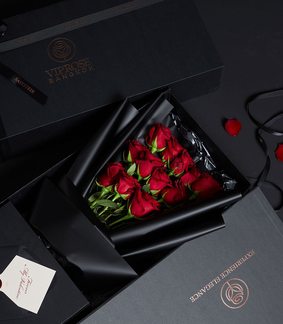 Premium red roses, a classic Valentine's Day gift from Flowers by Basketeer. This Thailand rose bouquet is nestled in a luxe black box with elegant tissue. For flower delivery Bangkok.