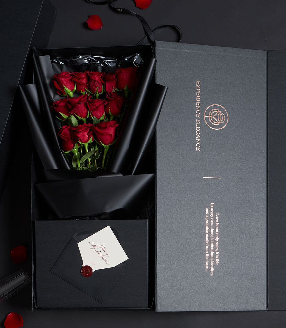 Luxurious Valentine red rose bouquet with black wrapping in elegant gift box, featuring twelve premium Ecuador roses with