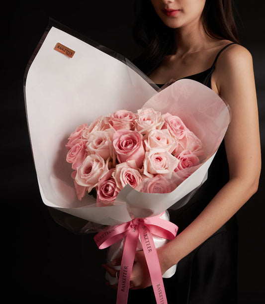 Luxury blush pink rose bouquet with O-Hara and Hermosa roses, wrapped in white and cellophane with pink ribbon, Valentine's