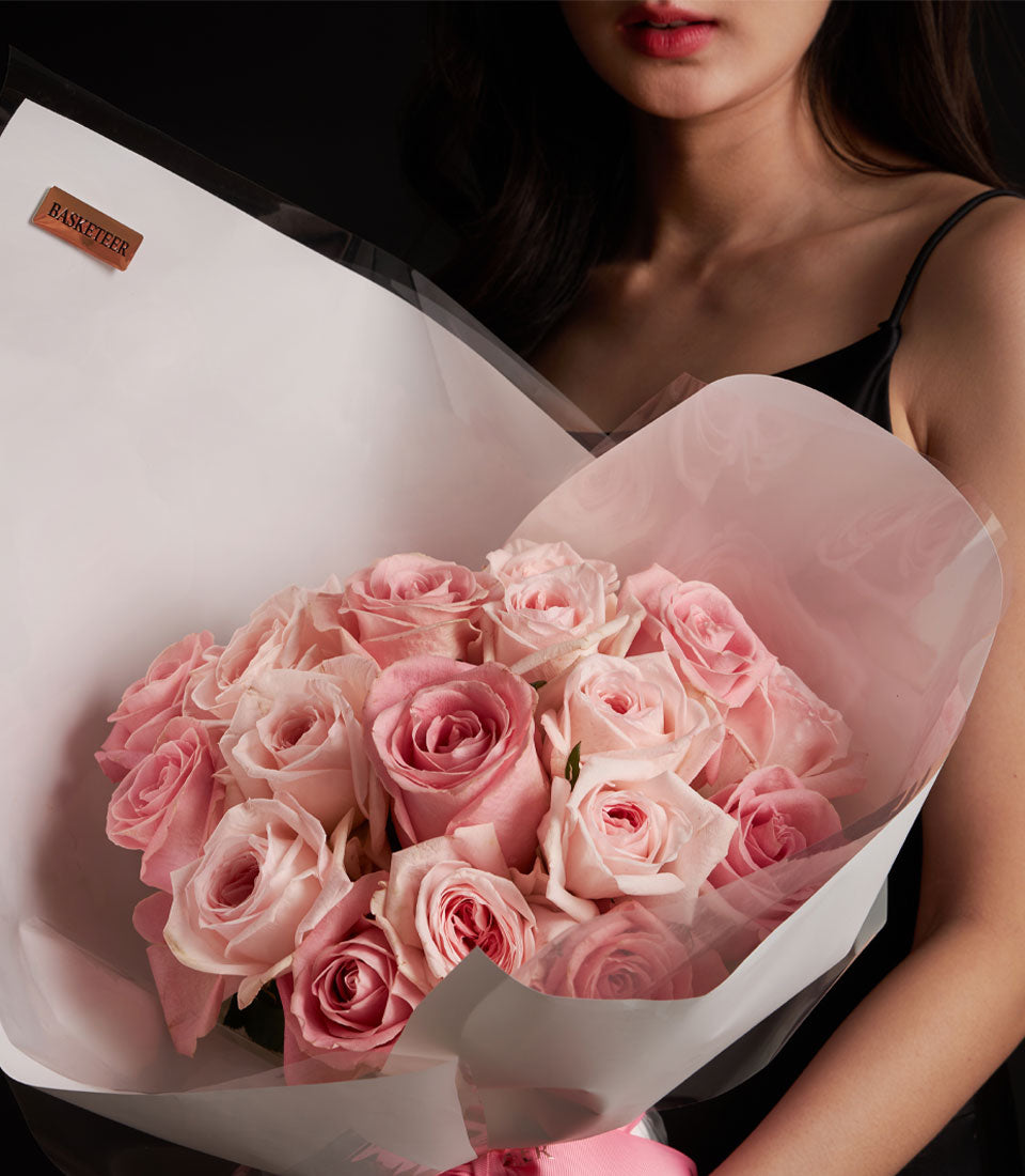 Elegant blush pink O-Hara roses from Flowers by Basketeer. A romantic bouquet, wrapped delicately for flower delivery in Bangkok, Thailand.