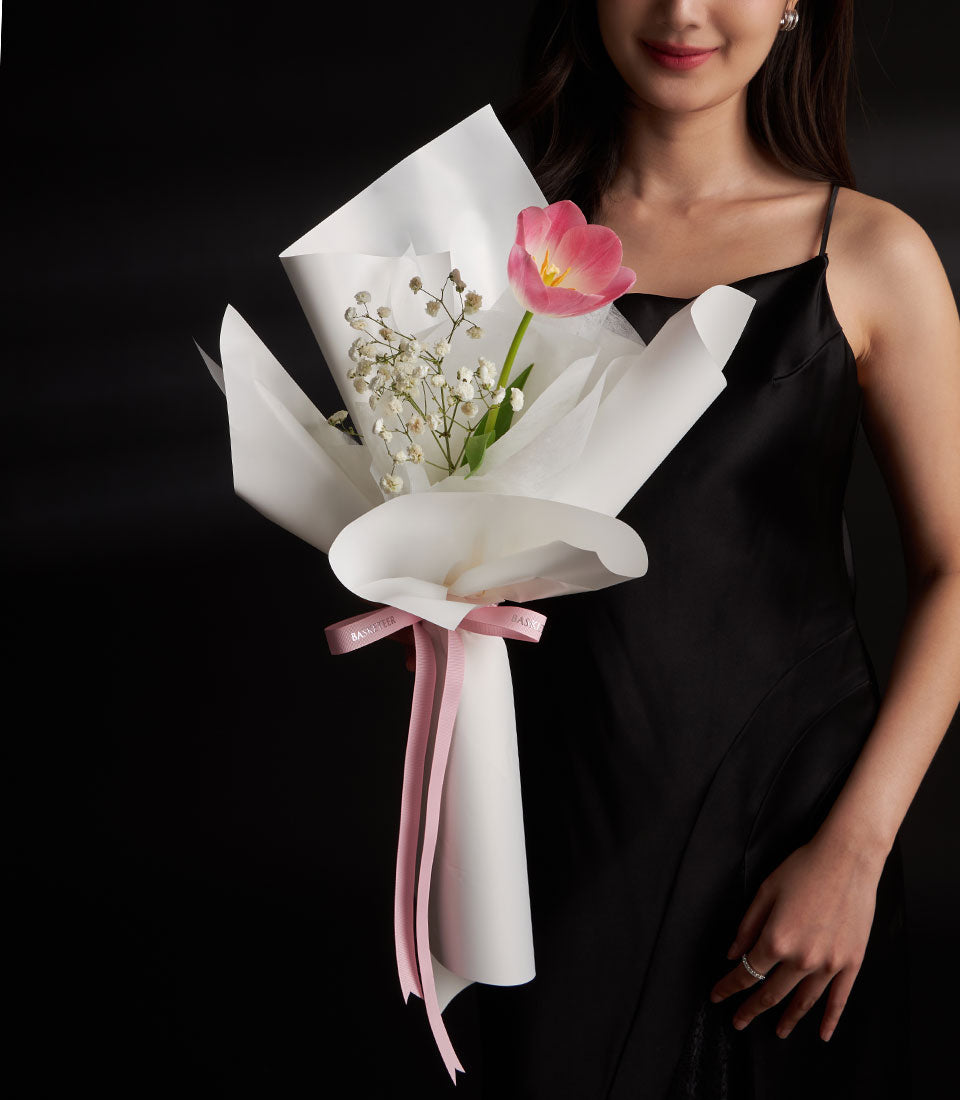 Pink tulip and white gypsophila Valentine bouquet with delicate ribbon wrap
