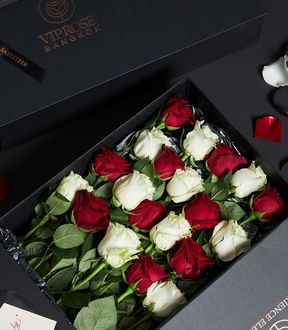 Red and white Ecuador roses in luxury black gift box with gold logo and black ribbon, Valentine's Day gift