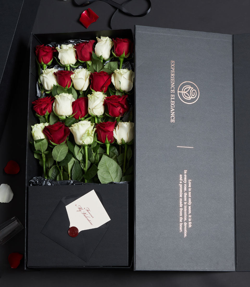 Luxury red and white Ecuador roses in black gift box with Valentine's card and wax seal