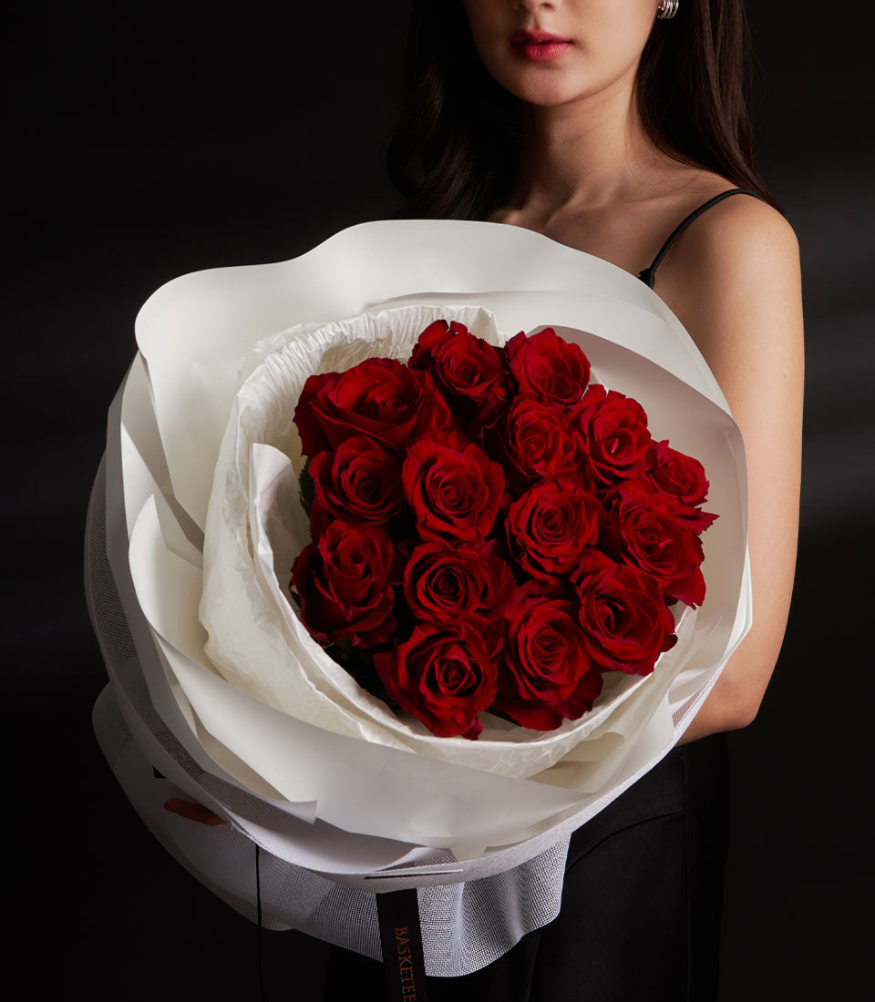 Romantic red rose bouquet from Flowers by Basketeer, a premium flower delivery Bangkok service. Ecuadorian roses wrapped in elegant white paper.