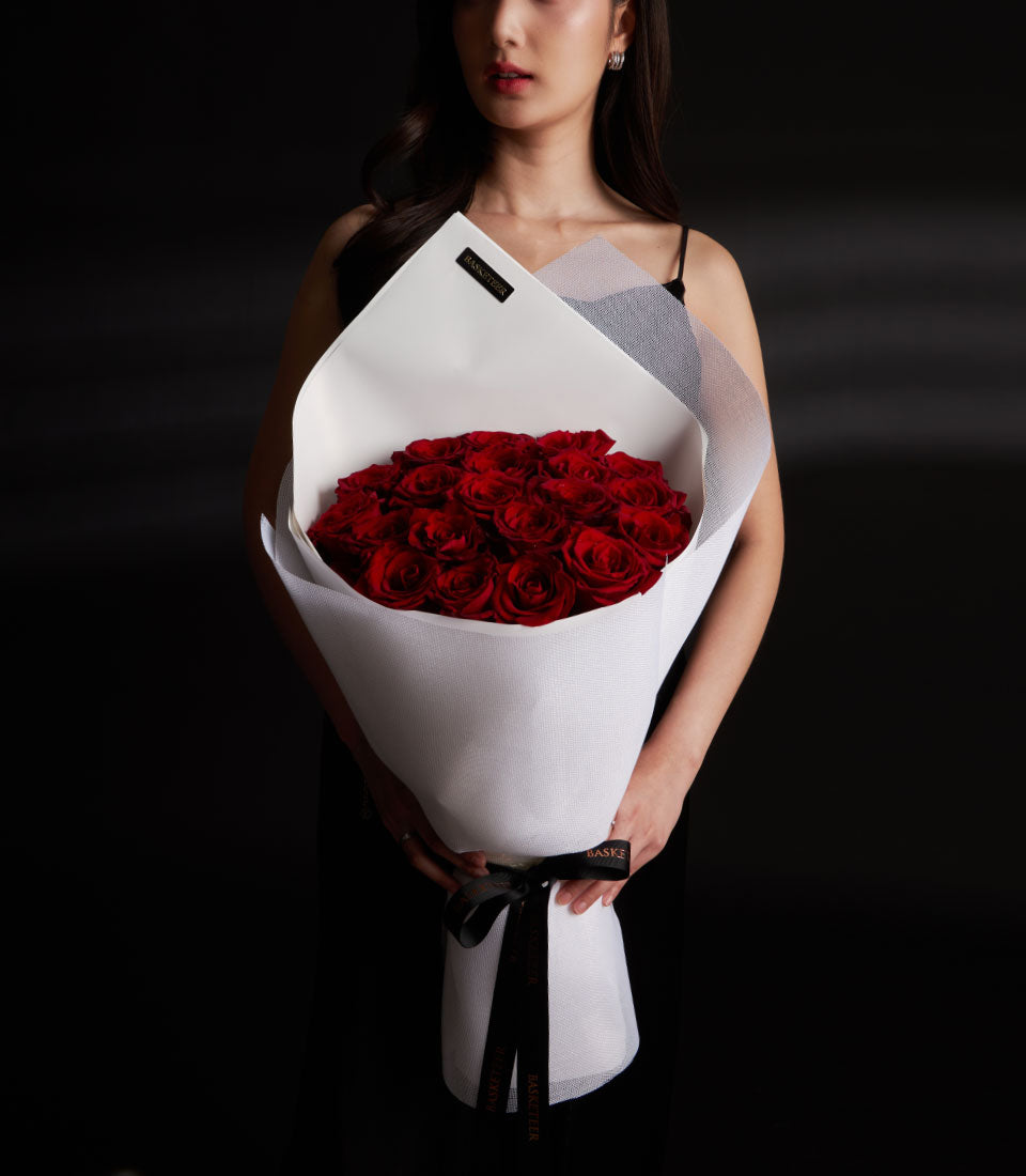 Red rose Valentine's bouquet with white wrap and black ribbon, Ecuador roses