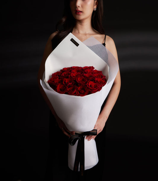 Red rose Valentine's bouquet with white wrap and black ribbon, Ecuador roses