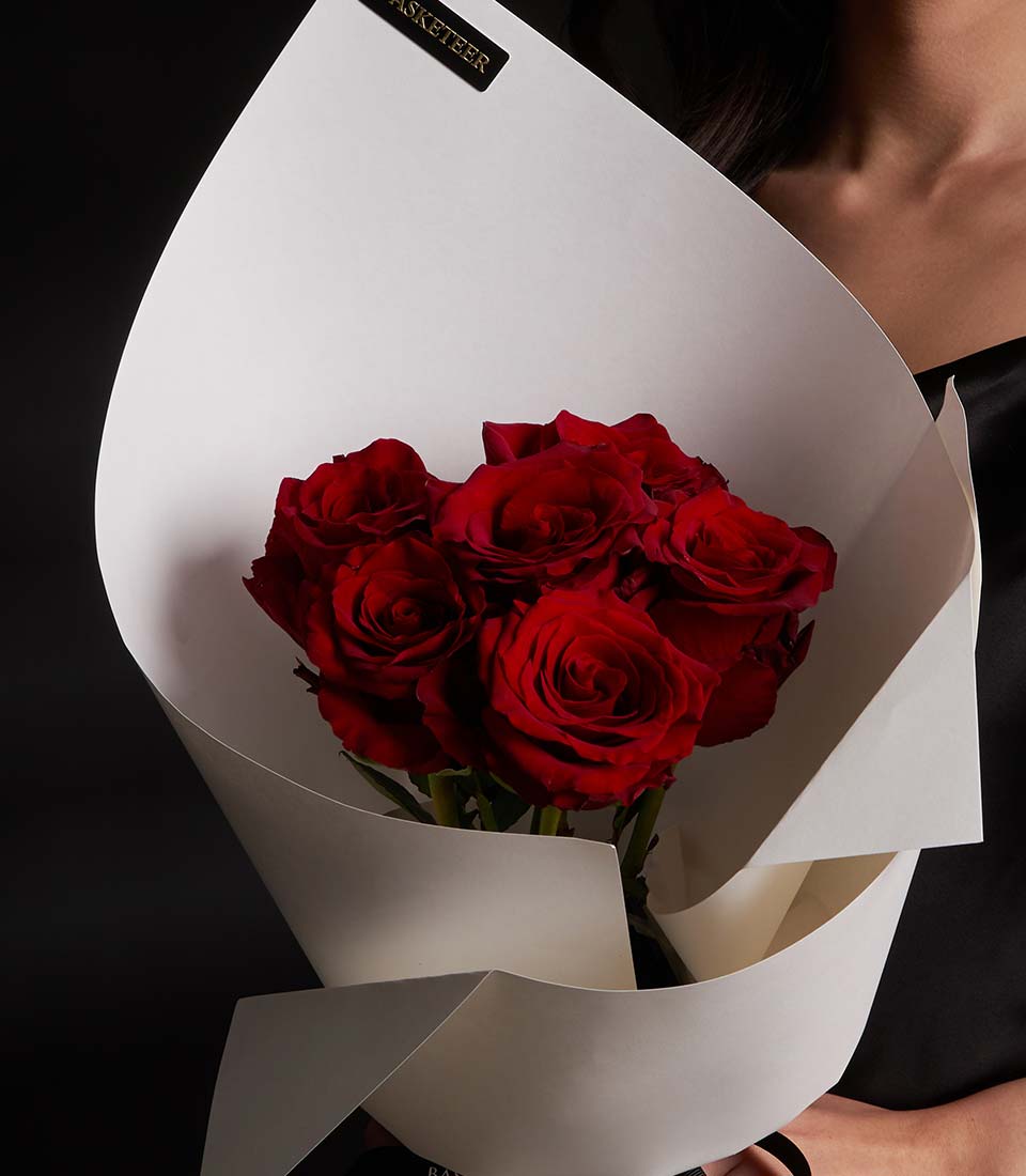 Premium red Ecuador roses in white paper wrapping, Valentine's Day bouquet