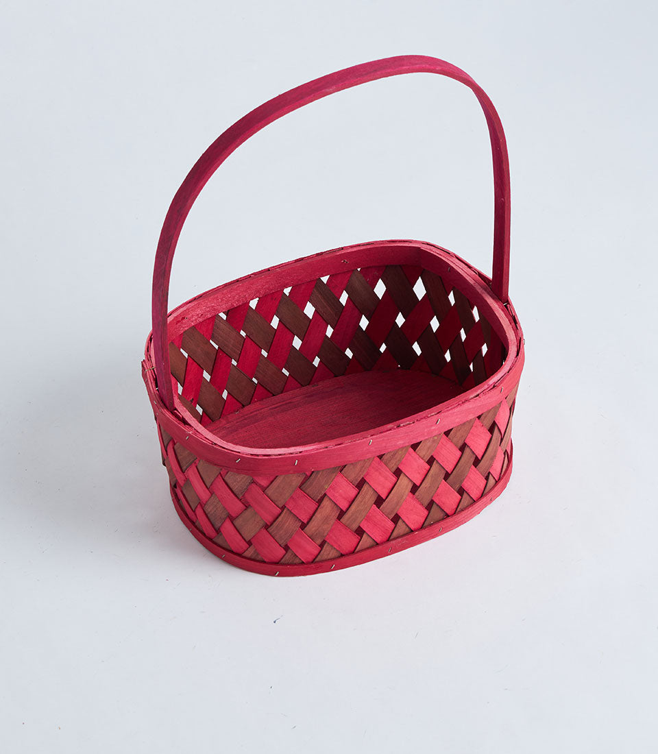 Red wooden weave basket with handle, diagonal striped woven design, perfect for luxury gift hampers and artisan presentations