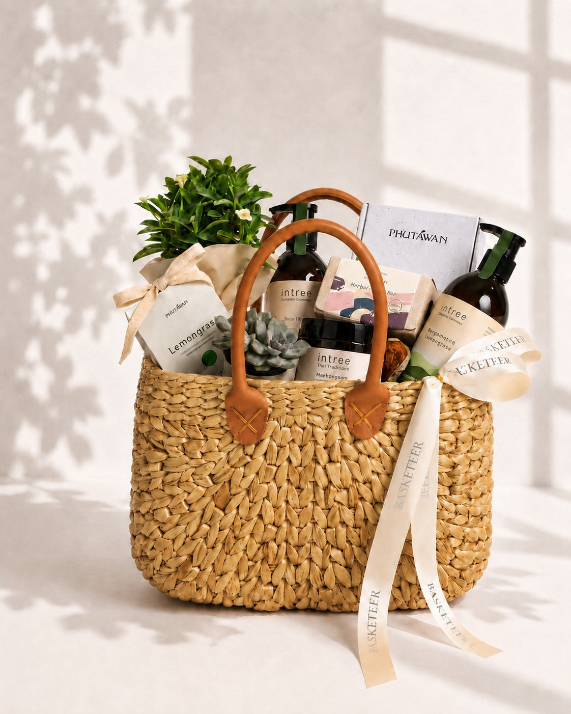 Basketeer's luxurious spa hamper in a woven wicker basket with elegant leather