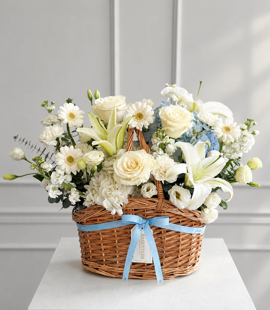 Basketeer luxury flower gift basket with white roses, lilies, hydrange