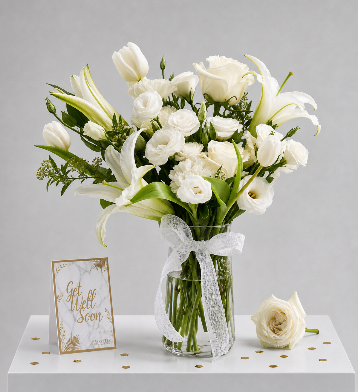 Elegant white flower arrangement by Flowers by Basketeer, featuring premium white lilies
