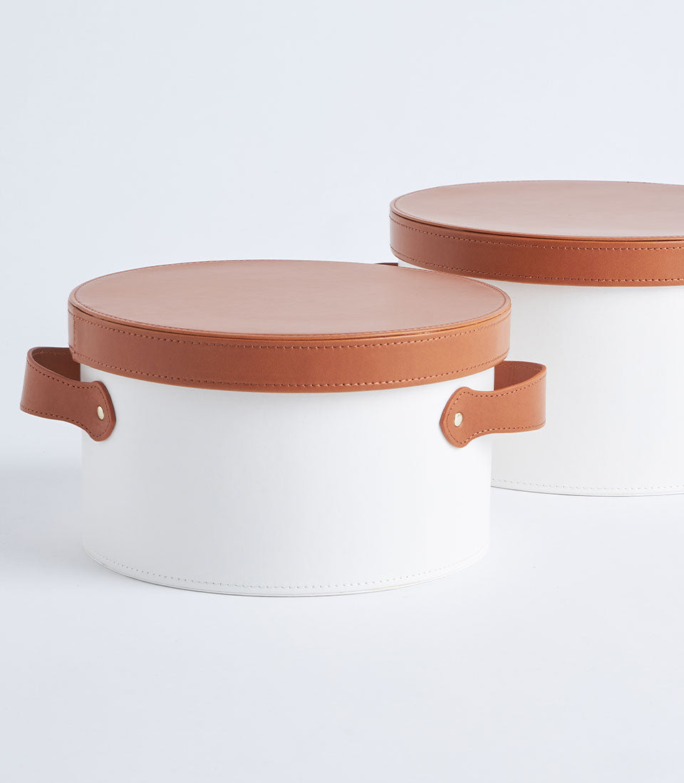 Basketeer's elegant white gift box with tan leather lid and handles