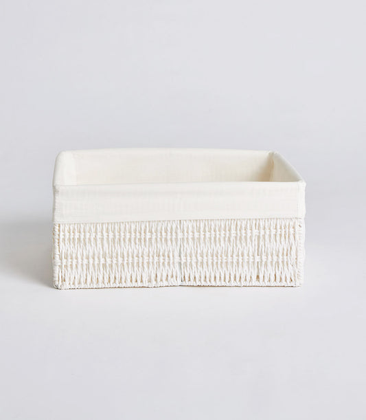 Handwoven rectangular wicker storage basket with cream fabric lining