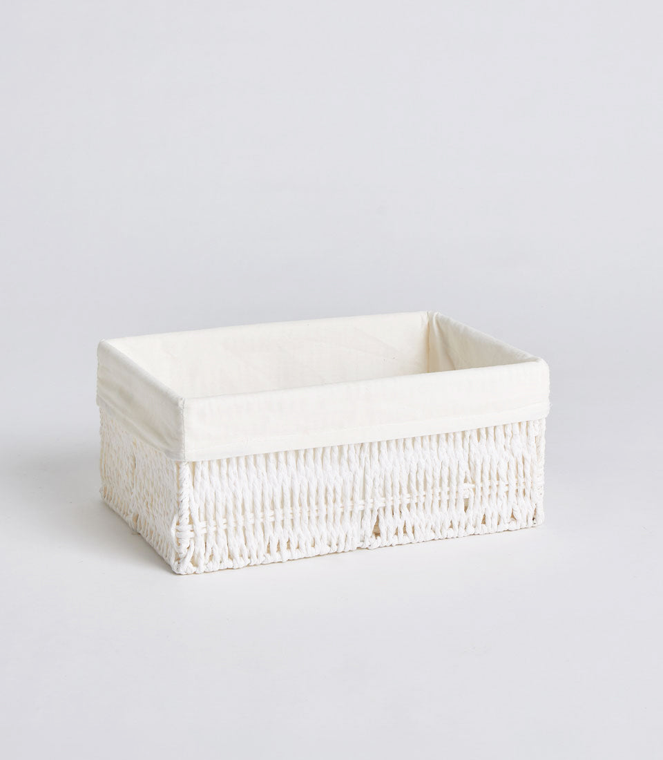 Handwoven rectangular wicker basket with cream fabric lining for gifting and storage