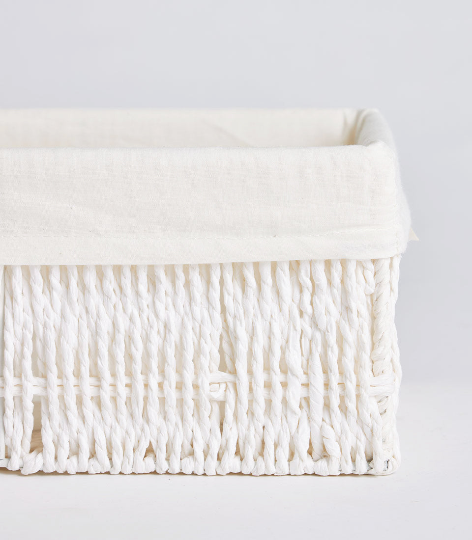 Handwoven white rectangular wicker basket with cream fabric lining for luxury gift hampers