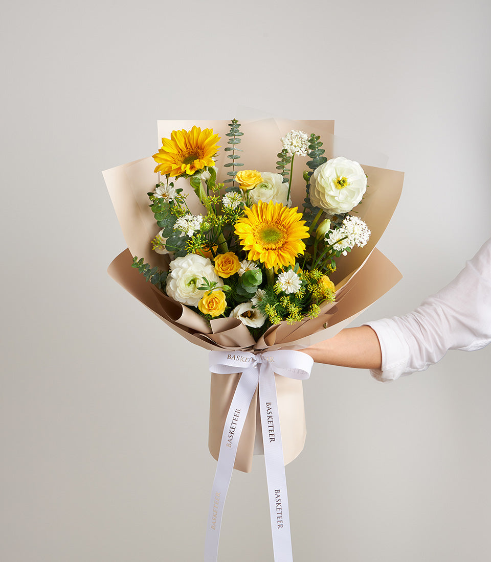 A vibrant sunflower bouquet from Flowers by Basketeer, featuring bright yellow