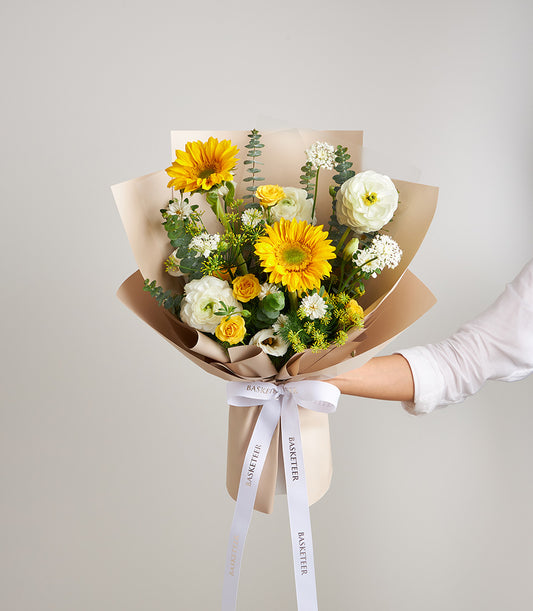 A vibrant sunflower bouquet from Flowers by Basketeer, featuring bright yellow
